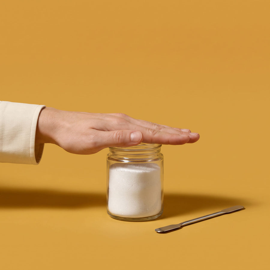 batch record 02 hero: bare hand closing an open jar of white powder
